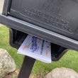 Load image into Gallery viewer, joke flyer from Prank-O for the Sparkler Warehouse in a mailbox